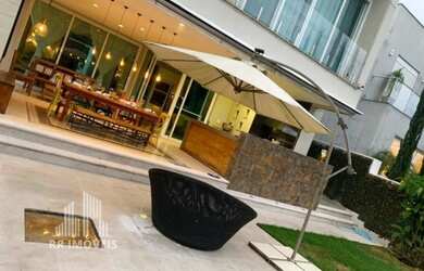 Imagem: A casa em condomínio possui 4 Dormitórios, 5 Banheiros, 5