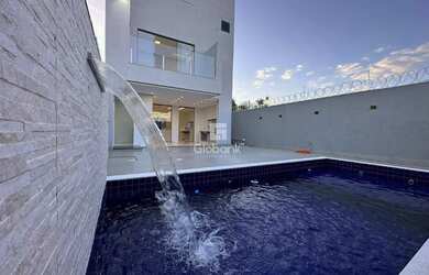 Imagem: A casa possui 3 Dormitórios, 4 Banheiros, 4 Vagas na garagem