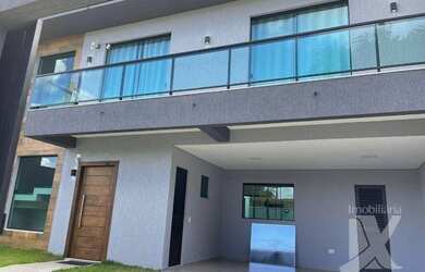 Imagem: A casa possui 3 Dormitórios, 1 Banheiro, 2 Vagas na garagem