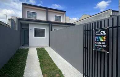 Imagem: A casa possui 2 Dormitórios, 1 Banheiro, 2 Vagas na garagem