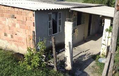 Imagem: A casa possui 2 Dormitórios, 2 Banheiros e está localizado