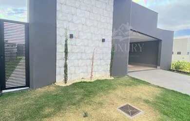 Imagem: A casa possui 3 Dormitórios, 4 Banheiros, 3 Vagas na garagem