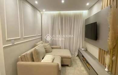 Imagem: O apartamento possui 2 Dormitórios, 1 Banheiro, 1 Vaga na garagem