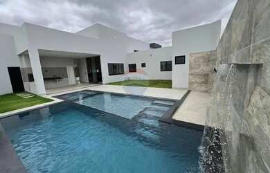 Imagem: A casa em condomínio possui 4 Dormitórios, 4 Banheiros, 5