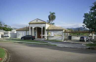 Imagem: A casa em condomínio possui 5 Dormitórios, 5 Banheiros, 450m²