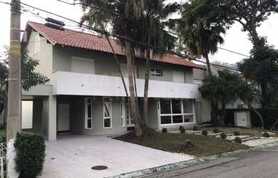 Imagem: A casa em condomínio possui 4 Dormitórios, 4 Banheiros, 2