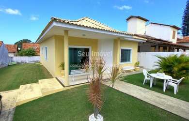 Imagem: A casa possui 3 Dormitórios, 2 Banheiros, 2 Vagas na garagem