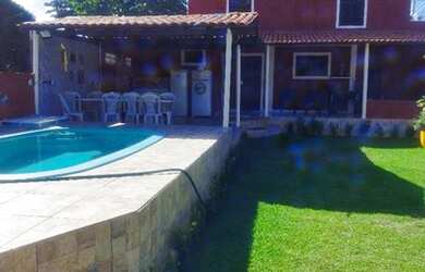 Imagem: A casa possui 5 Dormitórios, 4 Vagas na garagem e está localizado