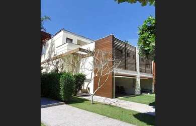 Imagem 11: Jequiti Residence no Guarujá. Casa pé na areia, frente ao mar