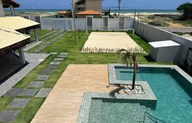 Imagem: A casa possui 5 Dormitórios, 5 Vagas na garagem e está localizado