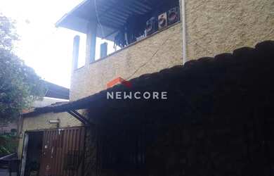 Imagem: A casa possui 3 Dormitórios, 2 Banheiros, 1 Vaga na garagem