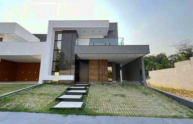 Imagem: A casa em condomínio possui 5 Dormitórios, 1 Banheiro, 4 Vagas