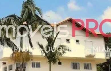 Imagem: A casa possui 5 Dormitórios, 5 Banheiros, 5 Vagas na garagem