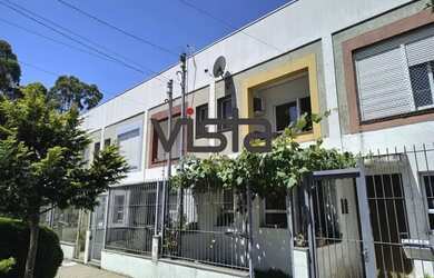 Imagem: A casa possui 2 Dormitórios, 1 Banheiro, 1 Vaga na garagem