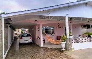 Imagem: A casa possui 3 Dormitórios, 3 Banheiros, 3 Vagas na garagem