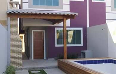 Imagem: A casa possui 4 Dormitórios, 3 Banheiros, 2 Vagas na garagem