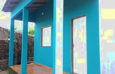 Imagem: A casa possui 2 Dormitórios, 1 Banheiro, 3 Vagas na garagem