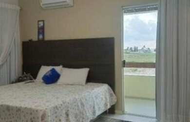 Imagem: A casa possui 4 Dormitórios, 5 Banheiros, 4 Vagas na garagem