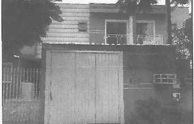 Imagem: A casa possui 2 Dormitórios, 1 Banheiro, 1 Vaga na garagem