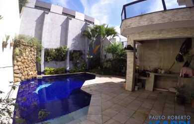 Imagem: A casa possui 5 Dormitórios, 5 Banheiros, 5 Vagas na garagem