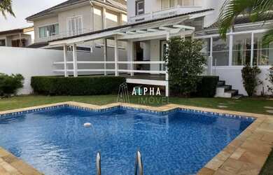 Imagem: A casa em condomínio possui 4 Dormitórios, 4 Banheiros, 4