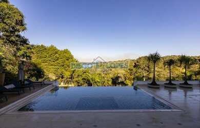 Imagem: A casa possui 5 Dormitórios, 5 Banheiros, 5 Vagas na garagem