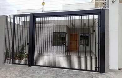 Imagem: A casa possui 3 Dormitórios, 3 Banheiros, 2 Vagas na garagem