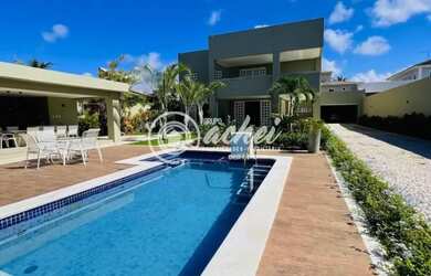 Imagem: A casa em condomínio possui 4 Dormitórios, 5 Banheiros, 2