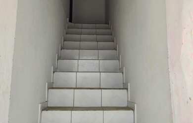 Imagem: A casa possui 4 Dormitórios, 2 Banheiros, 3 Vagas na garagem