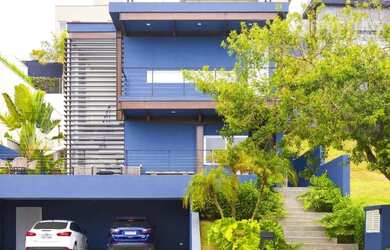 Imagem: A casa em condomínio possui 4 Dormitórios, 5 Banheiros, 4