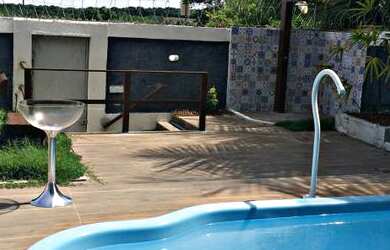 Imagem: A casa possui 5 Dormitórios, 5 Banheiros, 5 Vagas na garagem