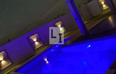 Imagem: A casa em condomínio possui 4 Dormitórios, 4 Banheiros, 2