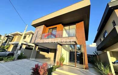 Imagem: A casa em condomínio possui 3 Dormitórios, 4 Banheiros, 2