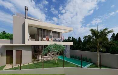 Imagem: A casa possui 4 Dormitórios, 5 Banheiros, 2 Vagas na garagem