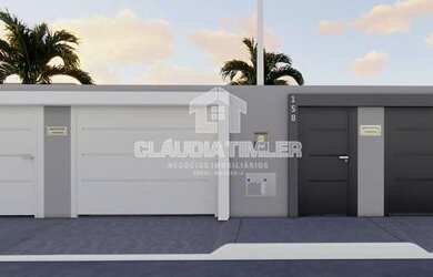 Imagem: A casa possui 3 Dormitórios, 3 Banheiros, 2 Vagas na garagem