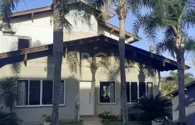 Imagem: A casa em condomínio possui 5 Dormitórios, 3 Banheiros, 5