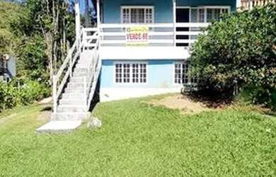 Imagem: A casa em condomínio possui 4 Dormitórios, 4 Banheiros, 5