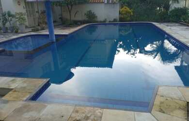 Imagem: A casa possui 5 Dormitórios, 5 Banheiros e 5 Vagas na garagem