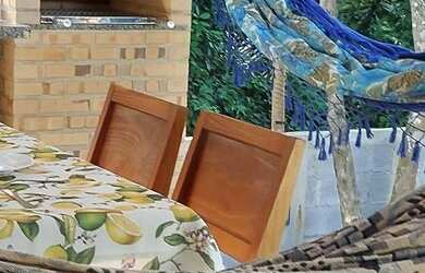 Imagem: A casa possui 2 Dormitórios, 2 Vagas na garagem e está localizado