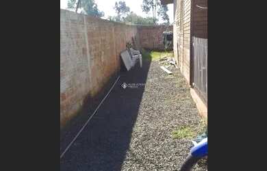 Imagem: A casa possui 1 Dormitório, 1 Banheiro, 1 Vaga na garagem