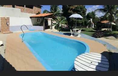 Imagem: A casa possui 5 Dormitórios, 5 Vagas na garagem e está localizado