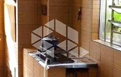 Imagem 12: Casa Localizada Em Rua Asfaltada