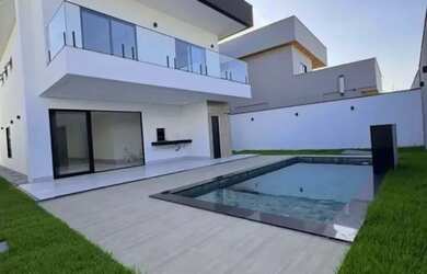 Imagem: A casa em condomínio possui 4 Dormitórios, 5 Banheiros, 2