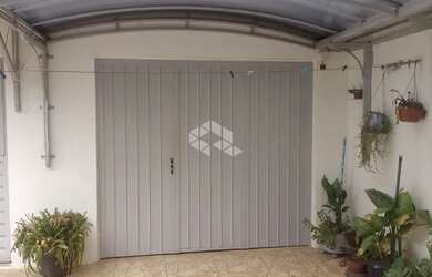 Imagem: A casa possui 2 Dormitórios, 1 Banheiro, 1 Vaga na garagem