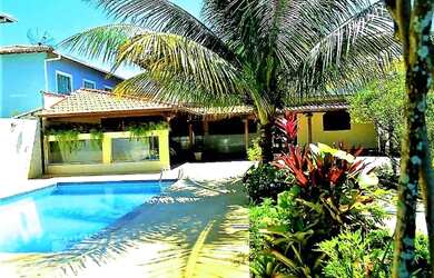 Imagem: A casa possui 3 Dormitórios, 3 Vagas na garagem e está localizado