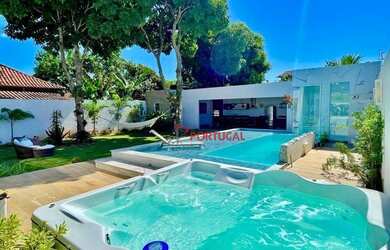 Imagem: A casa possui 5 Dormitórios, 5 Banheiros, 4 Vagas na garagem