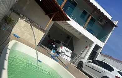 Imagem: A casa possui 1 Dormitório, 3 Banheiros, 4 Vagas na garagem