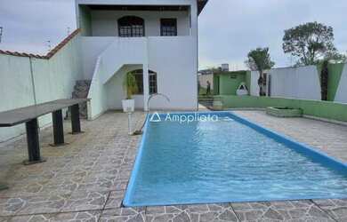 Imagem: A casa possui 3 Dormitórios, 2 Banheiros, 208m² de Área e