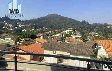 Imagem: A casa em condomínio possui 4 Dormitórios, 5 Banheiros, 420m²