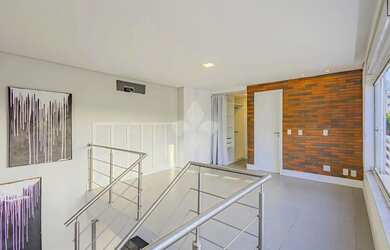 Imagem: O apartamento possui 1 Dormitório, 3 Banheiros, 1 Vaga na garagem